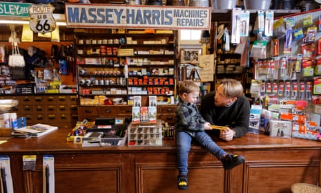 Thomas Lewis Jones with his son Arthur, the star of the ad, in Hafod Hardware store.