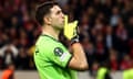 Emiliano Martínez shushes the crowd after saving Nabil Bentaleb's penalty during the Europa Conference League quarter-final second leg penalty shootout