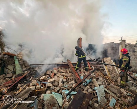 Firefighters work at the site of a private house destroyed during overnight Russian drone strikes, amid Russia's attack on Ukraine, in the town of Balakliia, in Kharkiv region, Ukraine.