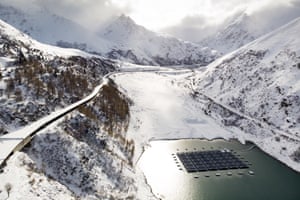 Barges fitted with solar panels on the Lac des Toules in Bourg-Saint-Pierre, Switzerland