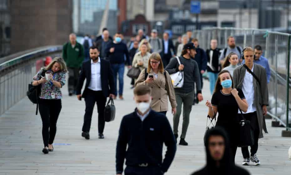 Office workers walking across London Bridge in September 2020 after an easing of lockdown rules