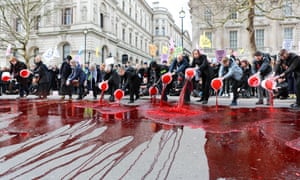Extinction Rebellion activists pour fake blood on the ground outside Downing Street. 5760.jpg?width=300&quality=85&auto=forma