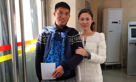Li Ze, left, and his wife Jia Meijian hope to have two children but worry about the high cost.