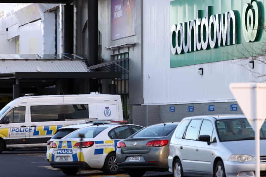 Police guard the area around Countdown LynnMall where a violent extremist stabbed six people