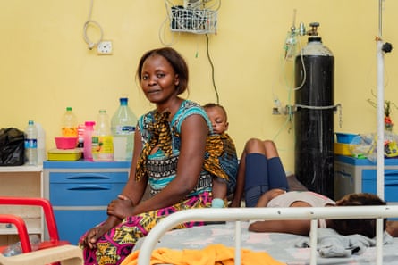 Jemima, eight, and her mother, Bertha Nanyinda, on the haematology ward.