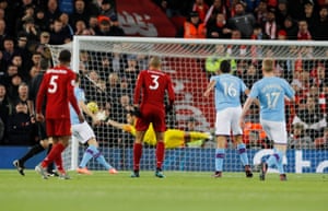 Fabinho launches a shot goalbound to score the opener for Liverpool.