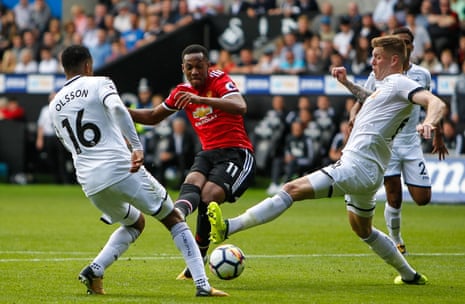 Anthony Martial slots home Manchester United’s fourth.