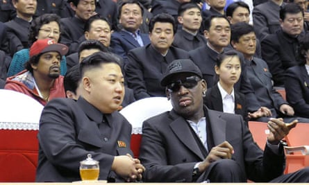 The North Korean leader, Kim Jong-un, left, chats to his friend Dennis Rodman, the former NBA star, at a basketball game in Pyongyang. 