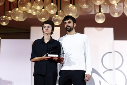 NAZA directors Rachel Szor, left, and Yuval Abraham with the special jury award at the Venice film festival closing ceremony