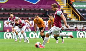 Chris Wood scores Burnley’s late equaliser from the penalty spot in the 1-1 draw against Wolves at Turf Moor.