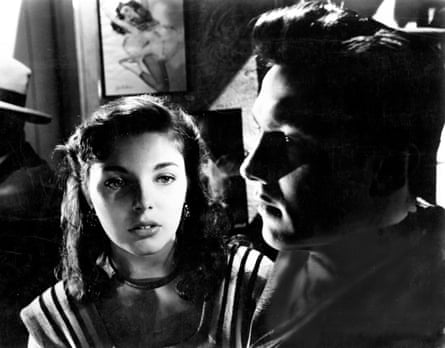Joan Collins with Laurence Harvey in her first film, 1952’s I Believe in You.