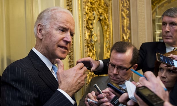 Joe Biden speaks with reporters following the cloture vote on the 21st Century Cures Act in Washington Wednesday.