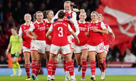 Arsenal's Freda Manam (centre) celebrates with teammate Lotte Vauban Moye after getting the home side back on level terms.