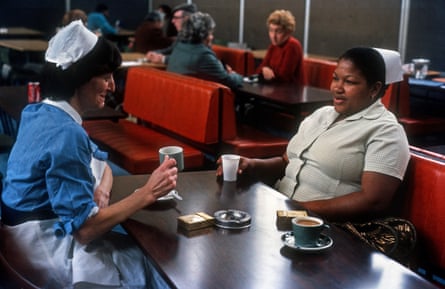 Two nurses enjoying a cup of tea.