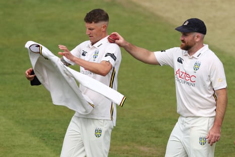 Durham bowler Brydon Carse is given the ball by Ben Raine after his five-wicket haul against Middlesex