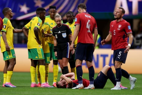 Players argue a call with referee Tori Penso as Lukas Cerv #12 of Czechia reacts on the pitch