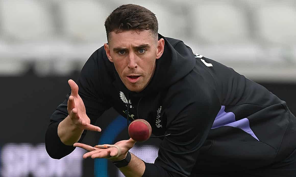 Dan Lawrence catches a ball during an England training session at Old Trafford