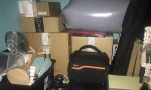 pile of things including boxes, bags, and saucepans