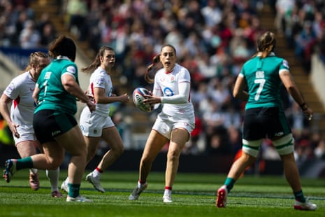 Holly Aitchison runs with the ball