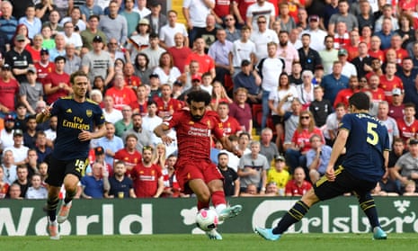 Salah slots the ball in for his second.