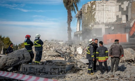 Emergency services clear the rubble of the house that was hit by an Iranian missile strike in Irbil, Iraq, on Tuesday.