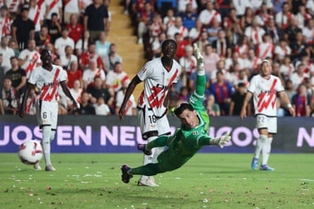 Rayo Vallecano’s Dani Cárdenas is beaten by Olmo’s late shot.