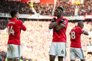 Jesse Lingard celebrates with Paul Pogba.