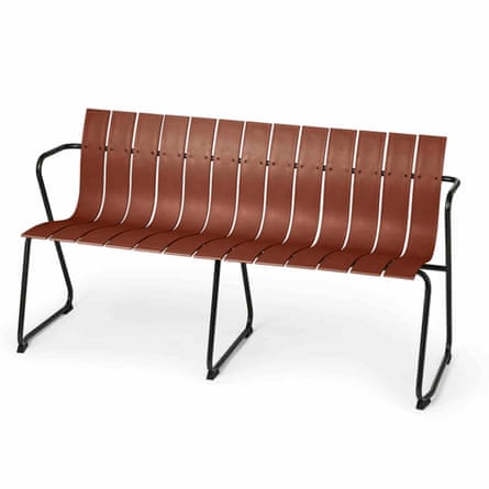 A bench with a metal frame and made of vertical curved wooden slats.