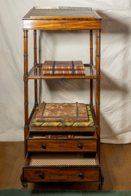Tall, slim mahogany desk with two drawers at the bottom and two shelves above them