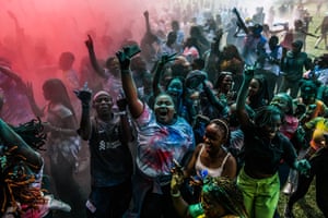 People covered with coloured powder celebrate Nairobi’s colour festival