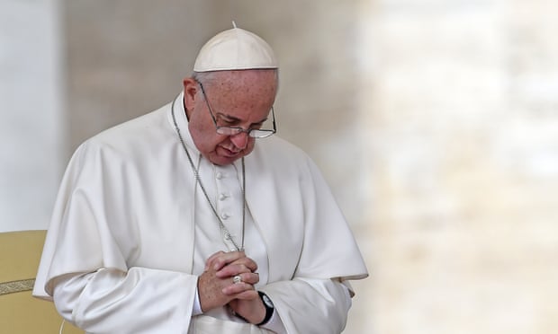 Pope Francis prays during his weekly general audience at St Peter’s Square on Wednesday.