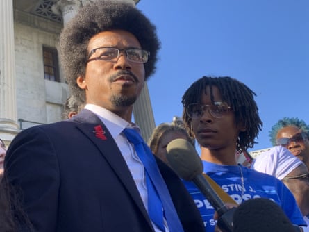 Justin Pearson speaks at a rally following the reinstatement of Justin Pearson to the legislature, joined by his fiancee, Oceana Gillian.