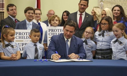 Ron DeSantis, the governor of Florida, signing the ‘don’t say gay’ bill in March 2022.