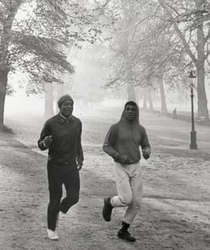 Jim Brown joins boxer Cassius Clay for a morning workout