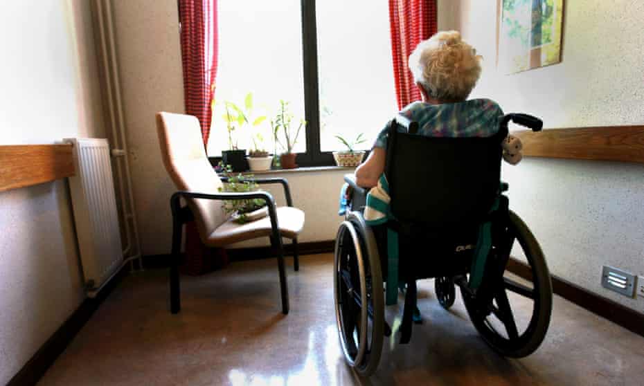 A woman in a wheelchair