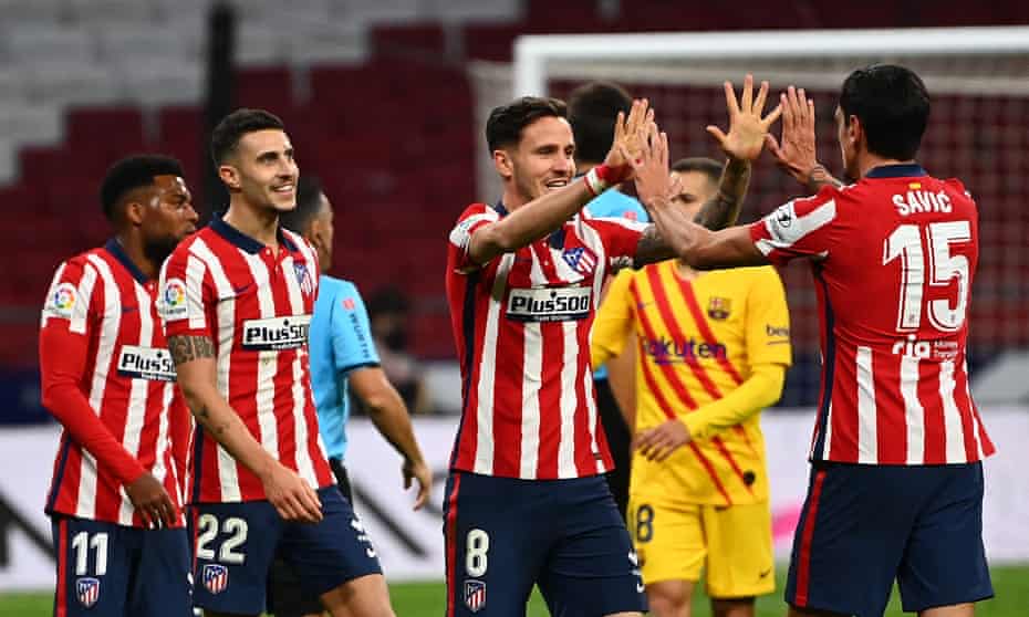 Atlético Madrid players celebrate after the 1-0 win over Barcelona.