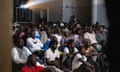 The audience at the Complexe Culturel Leopold Sedar Senghor watches the film in Pikine, Senegal.