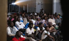 The audience at the Complexe Culturel Leopold Sedar Senghor watches the film in Pikine, Senegal.
