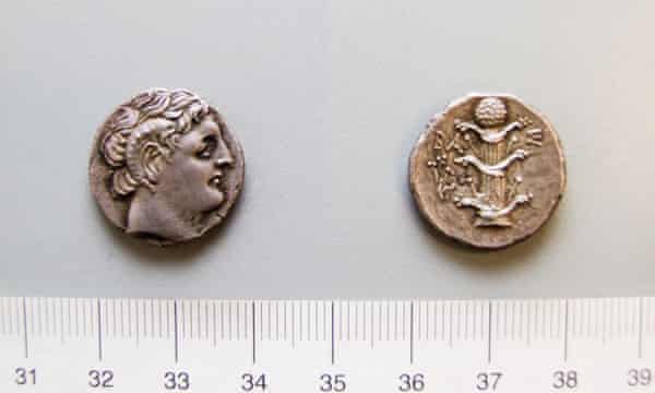 A coin from Cyrene shows the herb silphium on one side.