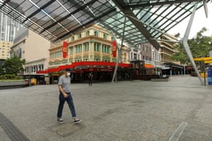 A person wears a mask in Brisbane’s Queens St Mall on Sunday.