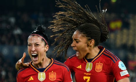Jenni Hermoso (left) celebrates with Salma Paralluelo after opening the scoring for Spain