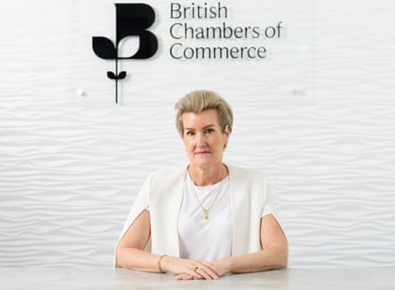 Shevaun Haviland seated in white top against white wall saying ‘British Chambers of Commerce’