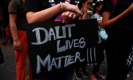 A demonstrator holds a placard reading 'Dalit Lives Matter' during a protest against the alleged gang-rape and murder of a 19-year-old woman in Uttar Pradesh state, in New Delhi on October 4, 2020.