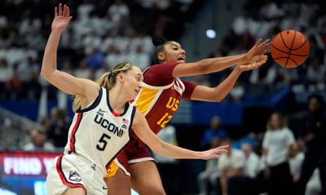 JuJu Watkins scores 25 as USC women hold off Paige Bueckers and UConn | College basketball | The Guardian