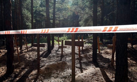 A mass burial site in Izium, Ukraine.