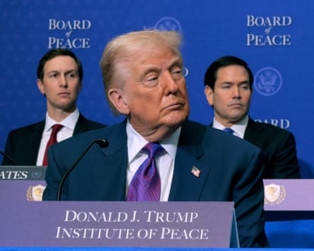 Kushner sits next to Rubio, behind Trump.