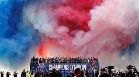 PSG celebrate with the Champions League trophy