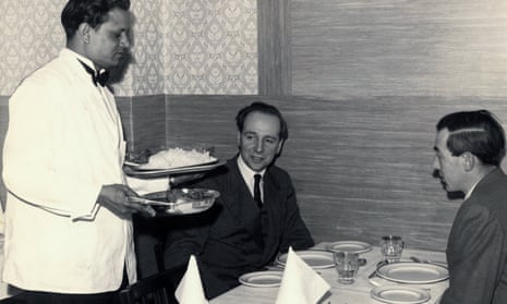 A waiter about to serve a meal in the Bombay Restaurant, Manchester, 1957. 