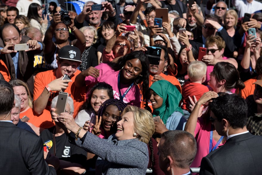 Hillary Clinton takes a selfie during a 2016 rally in Des Moines, Iowa.