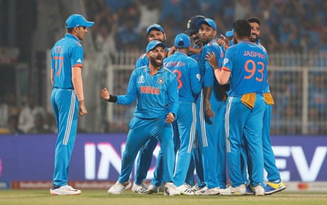 Virat Kohli of India (C) celebrates the wicket of Heinrich Klaasen of South Africa.